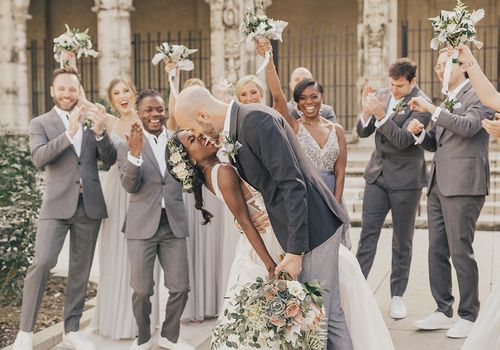 bride and groom with wedding party