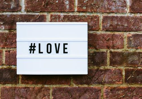 <p><p><p>hashtag love on a brick wall</p></p></p>