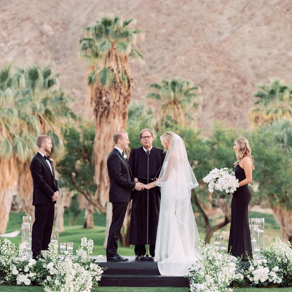 <p>bride and groom at altar</p>