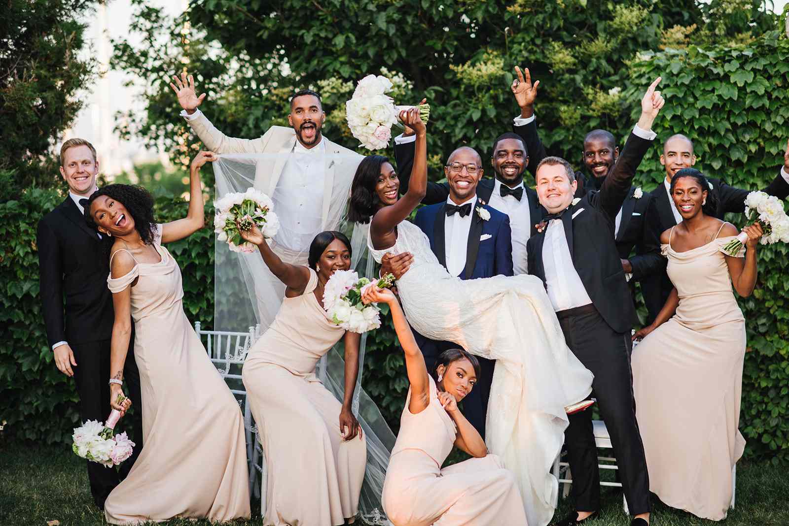 bride and groom with wedding party