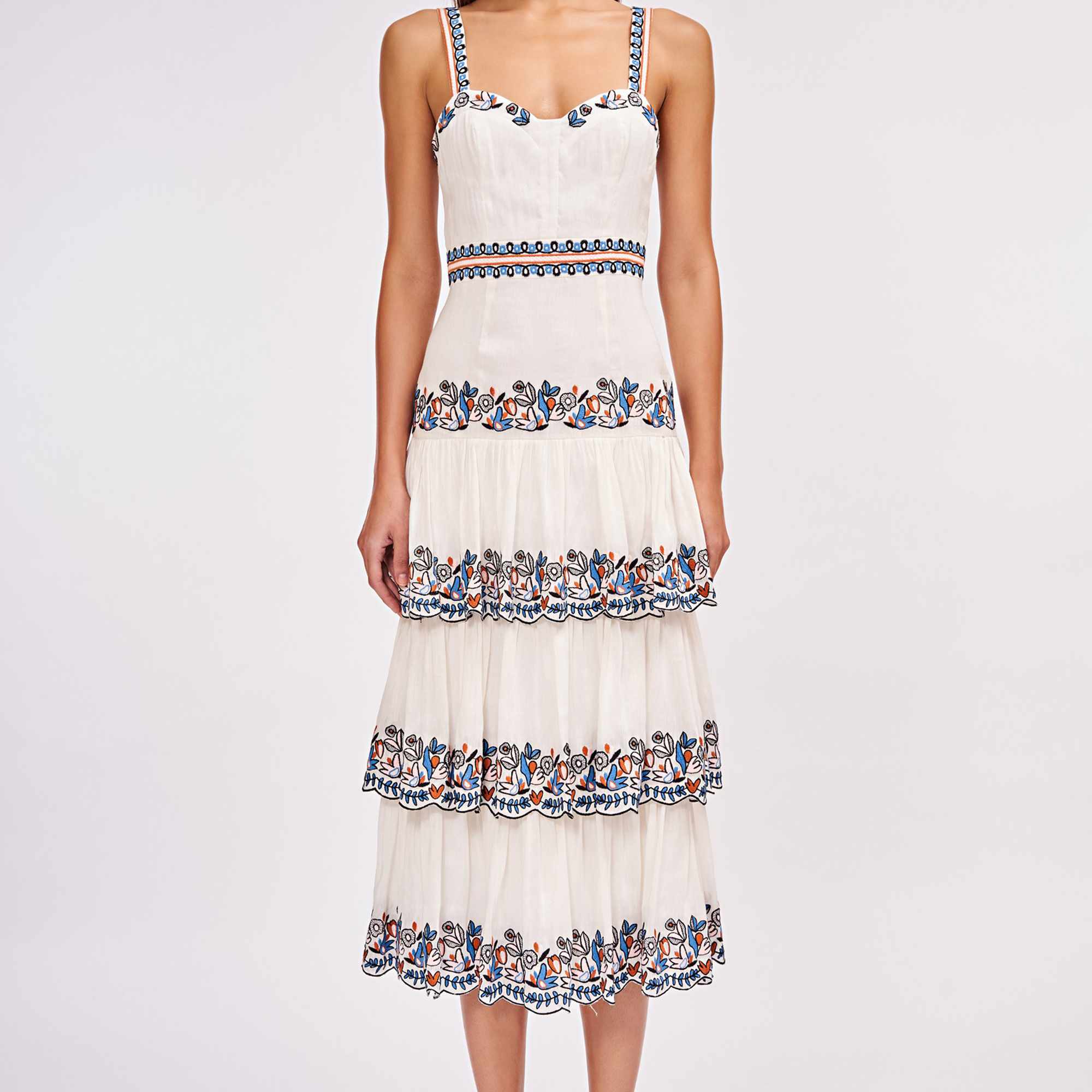 无袖的米子连衣裙，边框刺绣和褶边