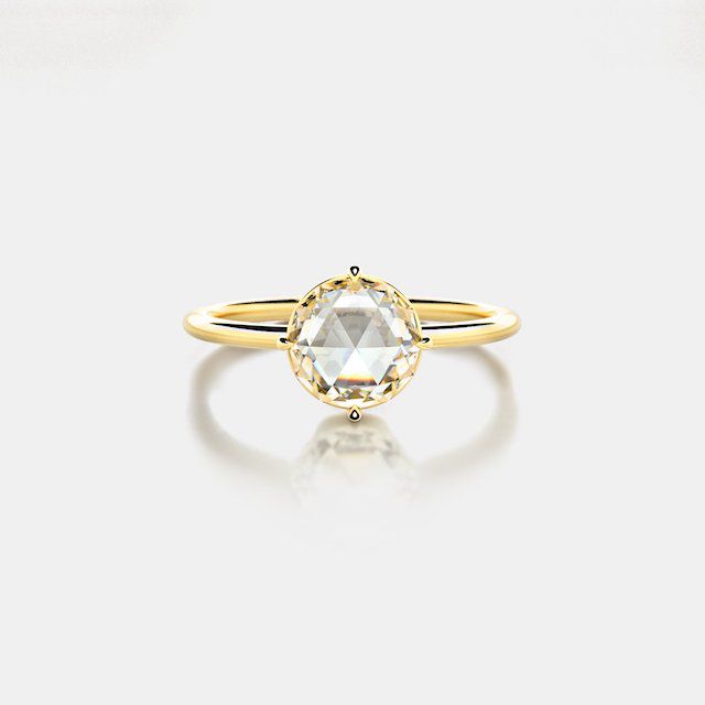 纸牌玫瑰色切割钻石与指南针点叉与黄金柄