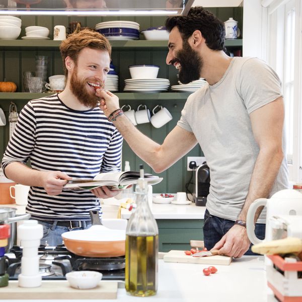 <p>Newlyweds Cooking Together at Home</p>