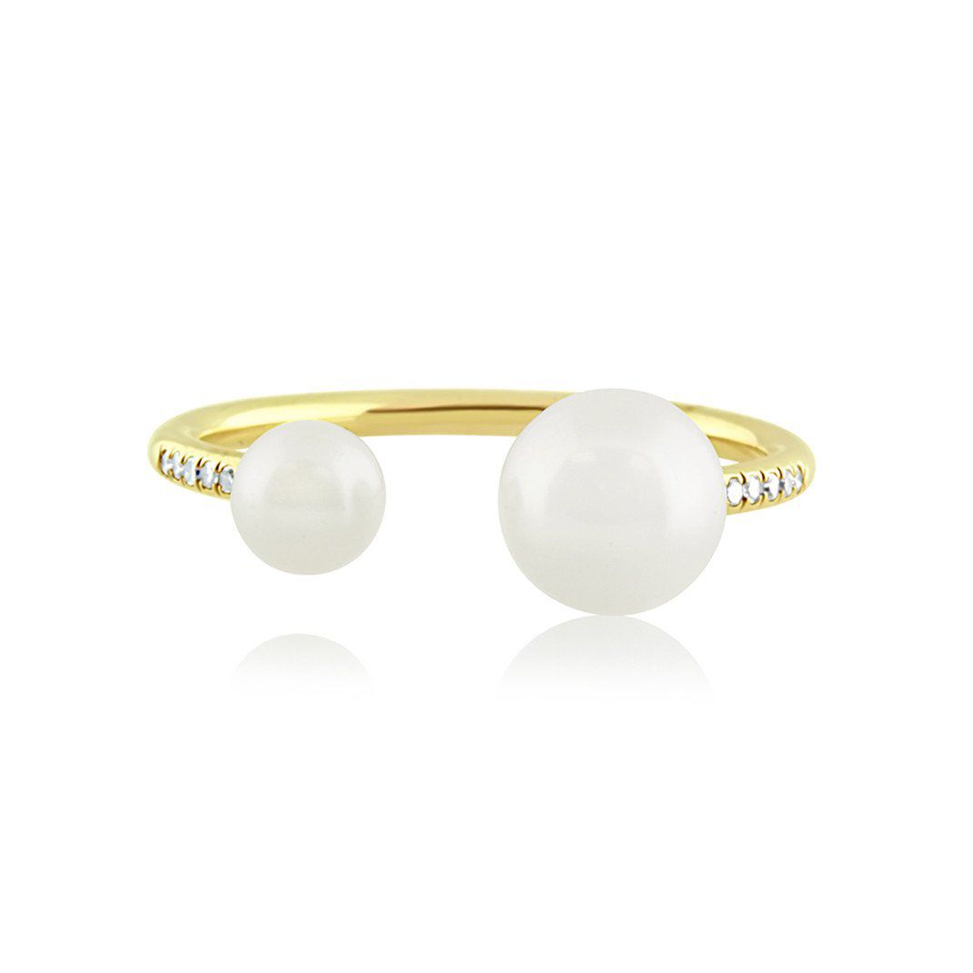 钻石和珍珠开放的戒指在黄金